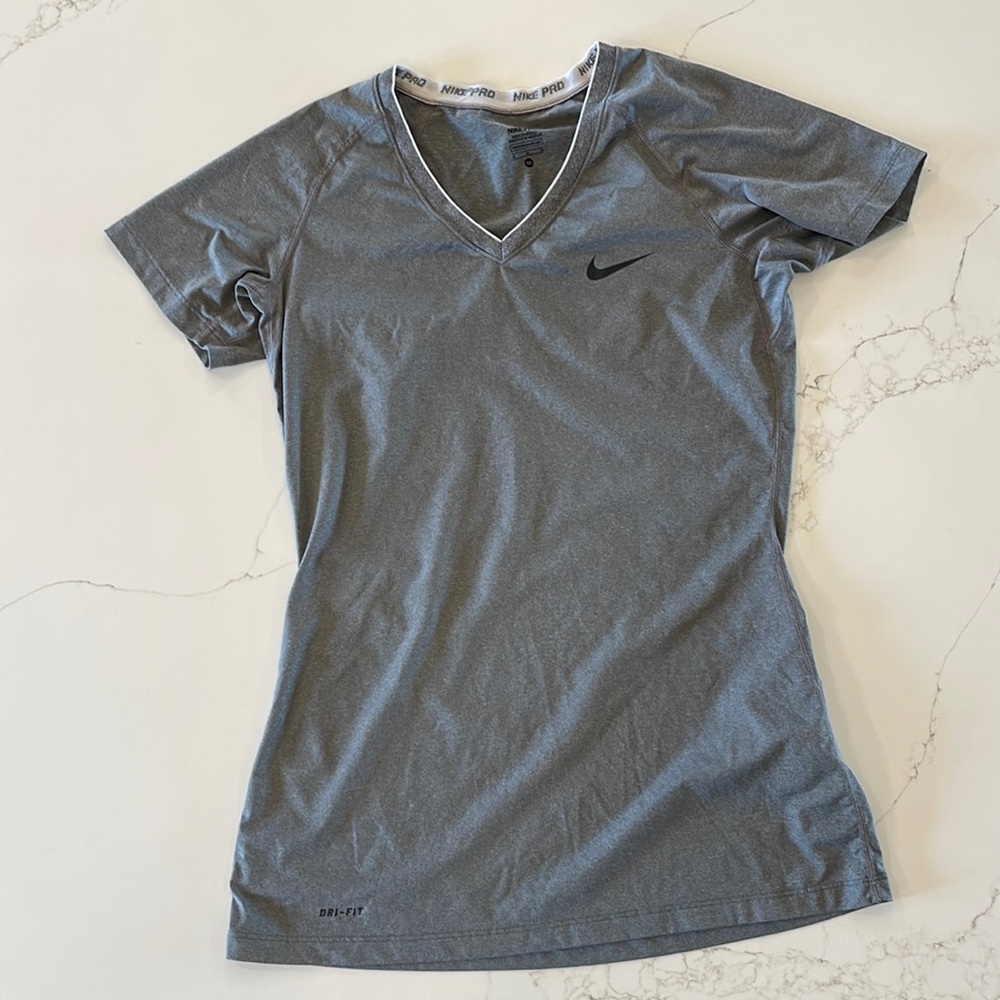 Women Nike Dri-fit T-shirt.